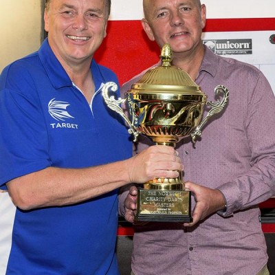 Lord Russell Baker Presenting Keith Deller the Trophy at the Norwich Charity Darts Masters in 2015.