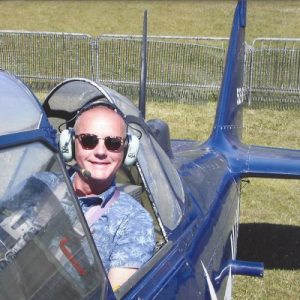 Lord Baker flying A T6 Harvard.